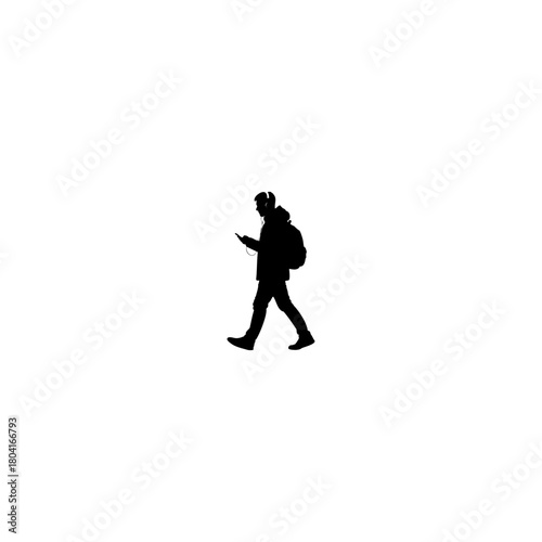 Silhouette of a student walking with backpack and headphones using phone on white background