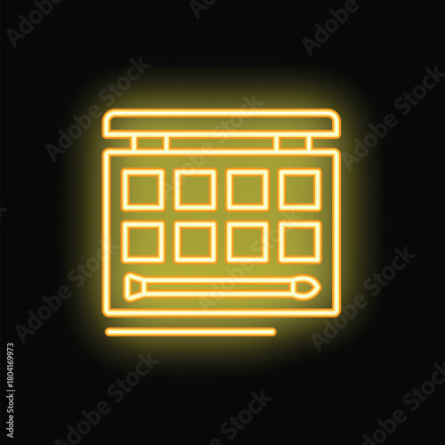 Neon sign of a makeup palette glowing yellow on a black background