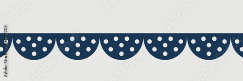 A repeating pattern of dark blue scalloped shapes filled with white dots against a light background image