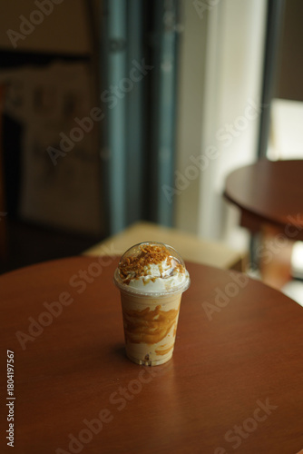 biscoff frape latte on the wood table