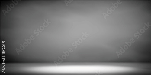 Empty room with a black and white wall background featuring a brushed metallic silver texture and industrial light pattern