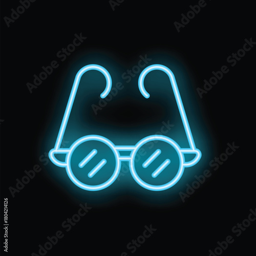 Round glasses glowing with blue neon light on black background, ideal for a banner of an optician or an eye clinic