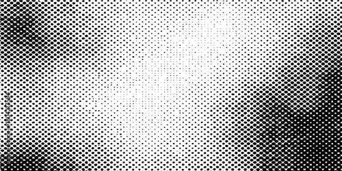 Seamless black and gray metallic mesh texture with a circular hole pattern for an industrial wallpaper design