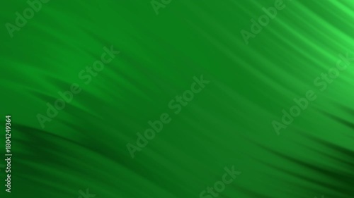 Abstract blurred background with vibrant green tones, suitable for web design, presentations, and artistic projects needing a dynamic visual.