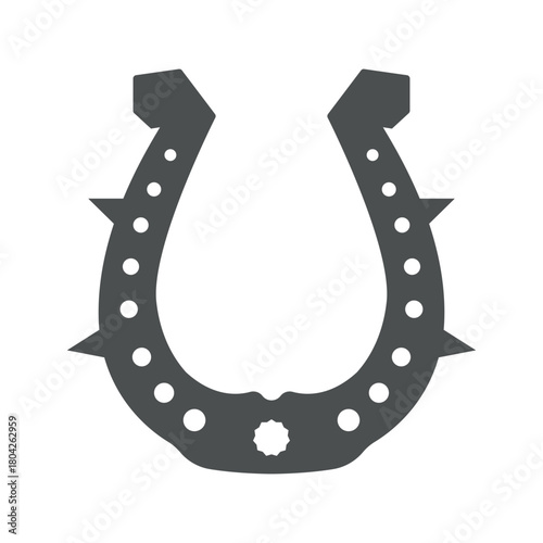Horseshoe silhouette with spikes, edgy lucky charm symbol in black vector
