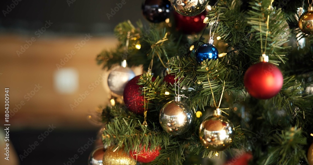 Fototapeta premium Christmas, decoration and wallpaper with baubles on tree in home for celebration, event or tradition. Background, festive and holiday with balls in apartment for aesthetic, December or winter season