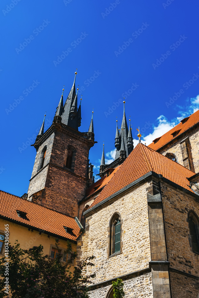Fototapeta premium Iconic Tyn Church towers dominate Prague skyline.