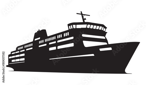  Silhouette of a large passenger ferry boat sailing on the water at night
