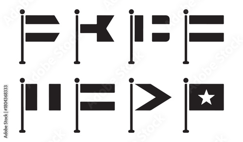  Collection of black and white nautical signal flags on poles representing maritime communication