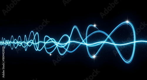 Dynamic blue light trails forming a wavy pattern with sparkles on a black background.
