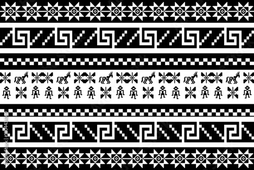 Black and white pixel art pattern featuring riders, horses, trees, and geometric tribal motifs arranged in bold decorative rows. 
