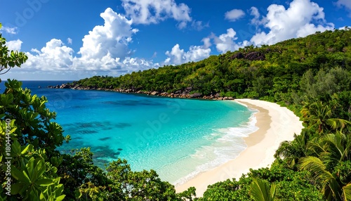 Fototapeta Naklejka Na Ścianę i Meble -  Lush green hills meet a pristine white sand beach and turquoise ocean.