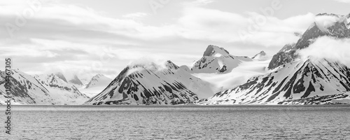 winter landscape with mountains, sea, snow and ice on spitsbergen Norway