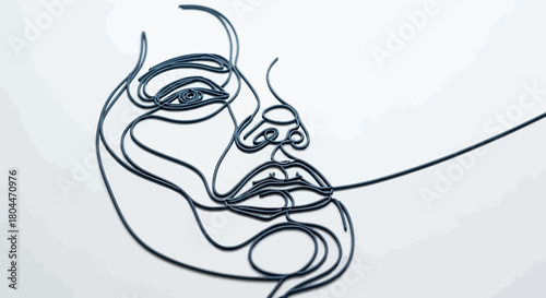 Wire art depicting a human face with detailed features on a white background in a minimalist style