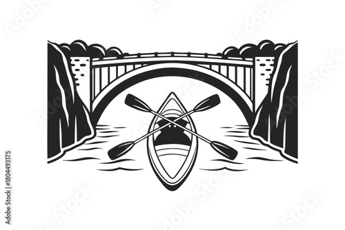 Simple black boat floats on calm water under a bridge between cliffs