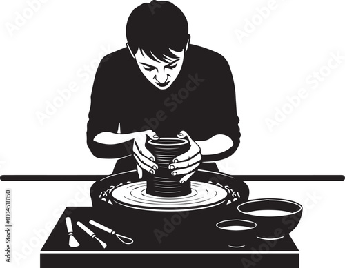 Focused artisan shaping clay on potter's wheel crafting handmade ceramic pottery art