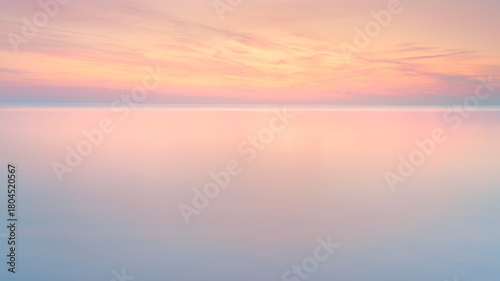 Ethereal Horizon at Twilight Over Calm Waters