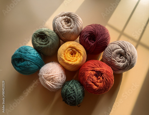 Soft Colorful Yarn Balls on a Cozy Background