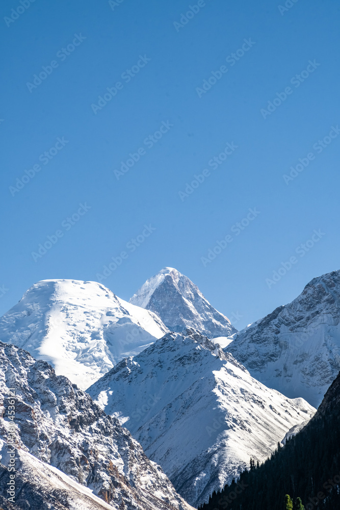 Fototapeta premium snow-capped mountain peaks. highlands, cliffs