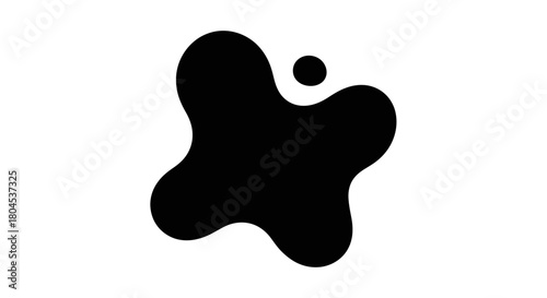 Black ink blot with irregular shape and a small dot, isolated on a white background.