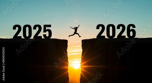 A silhouette of person jumps from 2025 to 2026 cliff in the sunset, symbolizing hope and moving forward. new year 2026, new year background 
