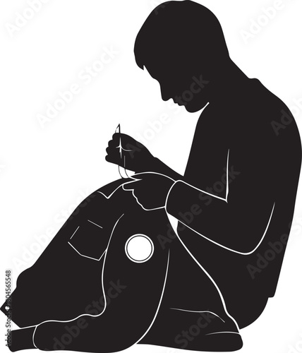 Silhouette of a person engaged in a detailed hobby sewing or crafting with a needle and thread