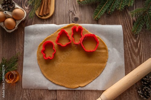 making homemade Christmas cookies on a wooden background. flat lay