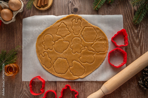 making homemade Christmas cookies on a wooden background. flat lay