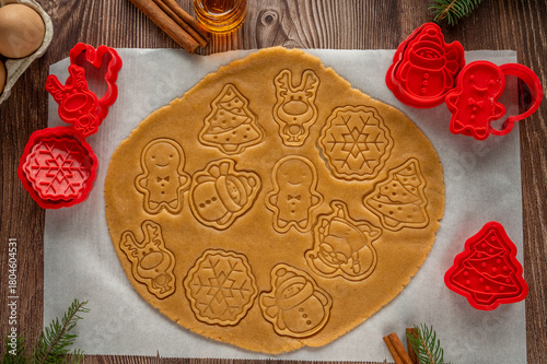 making homemade Christmas cookies on a wooden background. flat lay