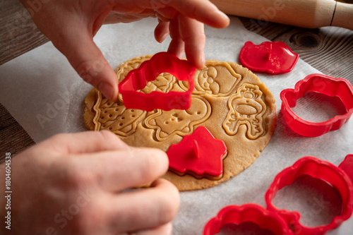 making homemade Christmas cookies on a wooden background. flat lay
