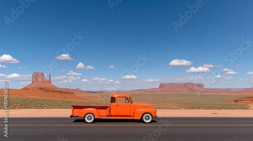 Wallpaper Mural An orange flatbed truck cruising along a sunlit desert highway amidst stunning red rock formations and endless blue skies Torontodigital.ca