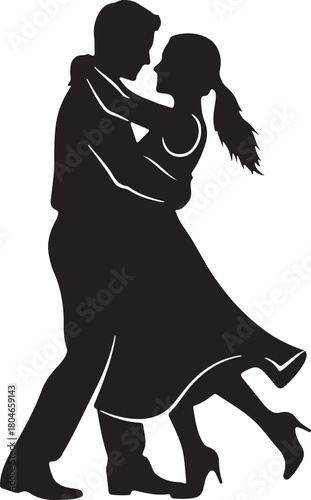 Romantic silhouette of a couple dancing together embracing in a passionate tango or waltz