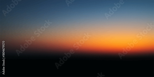 Beautiful orange and red sunset light over the sea horizon