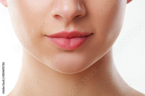 Photography Softly defined lips enhance natural beauty of a young woman with flawless skin c