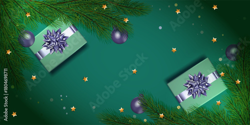 Christmas decorations with two gifts, balls and fur tree on green background. Mockup for your xmas design.