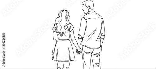 Couple holding hands walking together enjoying their time love and affection.