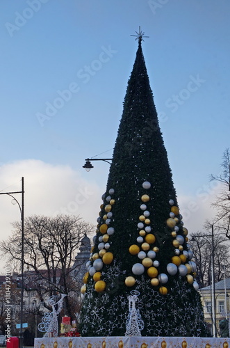 Happy New Year and Christmas with a view of a beautiful Christmas tree in a central city square,  Sofia, Bulgaria   