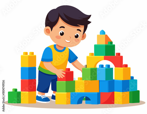 A young boy with dark hair smiles while building a colorful tower with interlocking plastic blocks.