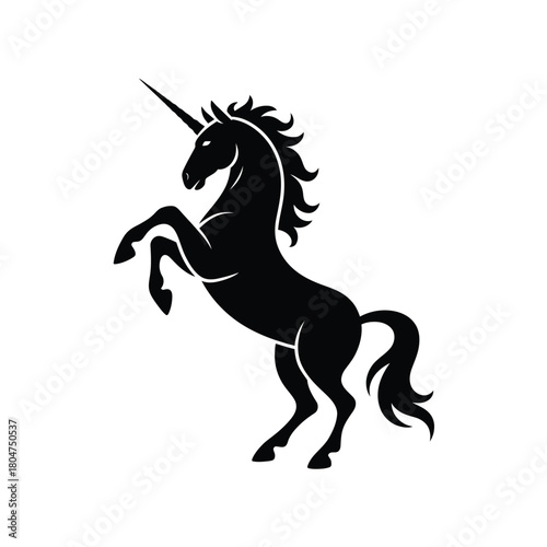 Silhouette of a majestic unicorn rearing up on its hind legs