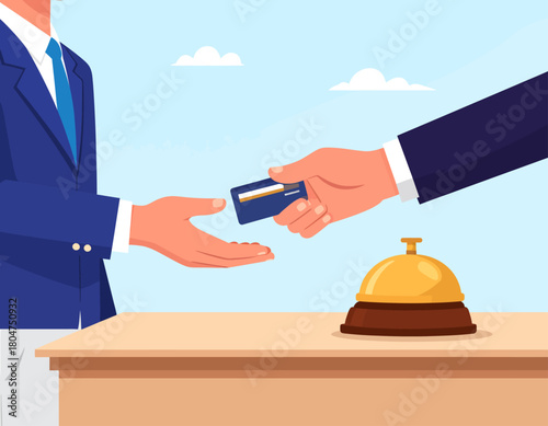 A customer in a suit hands a credit card to a receptionist at a hotel front desk with a bell.