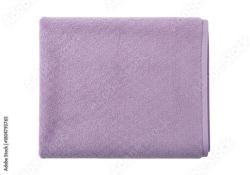 Fotografie Isolated purple towel folded for bathroom, spa or hotel, terrycloth fabric textu