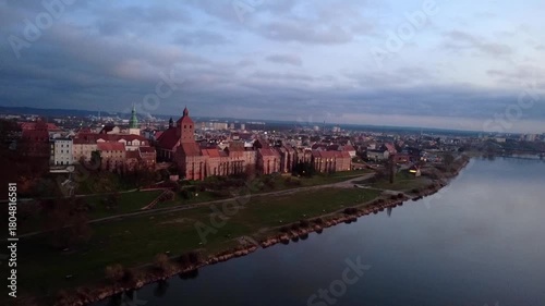 Drone panorama of Grudziadz skyline with the 14th-century Granaries complex and the winding Vistula River, Poland