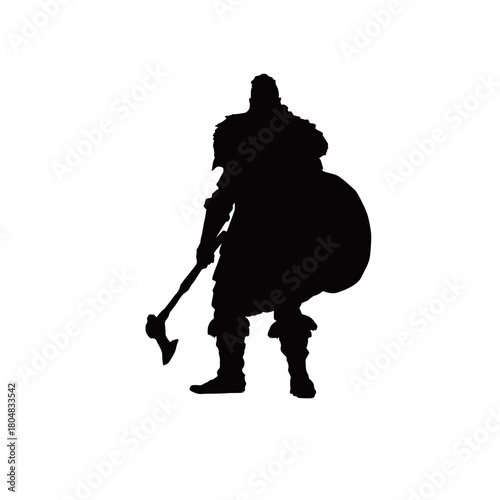 Silhouette of a strong warrior with an axe and shield standing ready for battle