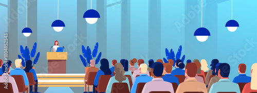 Conference speaker presentation audience listening modern seminar hall podium stage plants hanging lamps blue background website banner