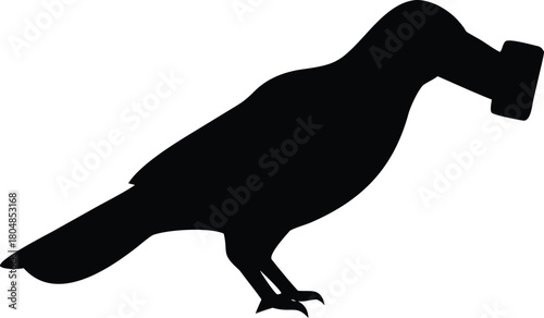 Black silhouette of a crow holding a book in its beak