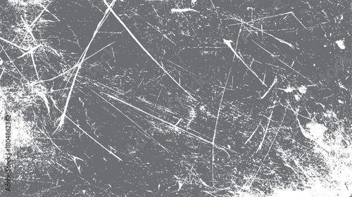 Abstract distressed grunge texture background with white scratches and speckles on a dark gray surface