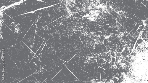 Distressed grunge texture with white scratches and speckles on a dark gray background abstract surface
