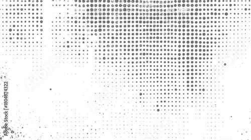 Gray circular dots of varying sizes and densities arranged in a grid-like pattern on a white background with scattered speckles