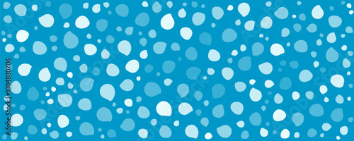 Light blue background and randomly placed flakes. Vector seamless pattern of white dots of different sizes.