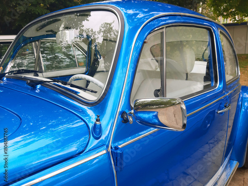 Blue metallic vintage car.Horizontal Photo.